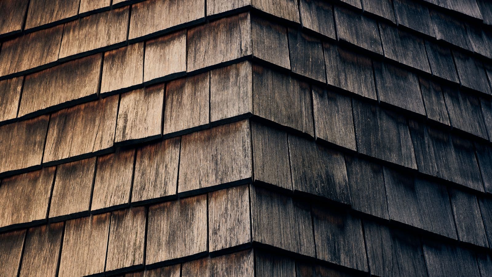 Close view of weathered wood shingle siding